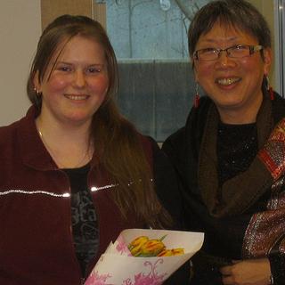2009 Anthropology Awards Reception Katie, left, is one of two recipients of this year's Anthropology Club Award. Imogene Lim, right, presents her with flowers and her award; March 12, 2009. 