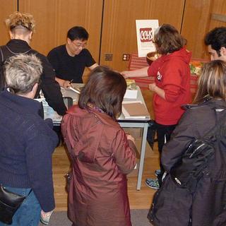 Escape to Gold Mountain Reading David Wong, author, signing books for audience members. Reading sponsored by the Offices of Social Sciences, and Arts & Humanities. 